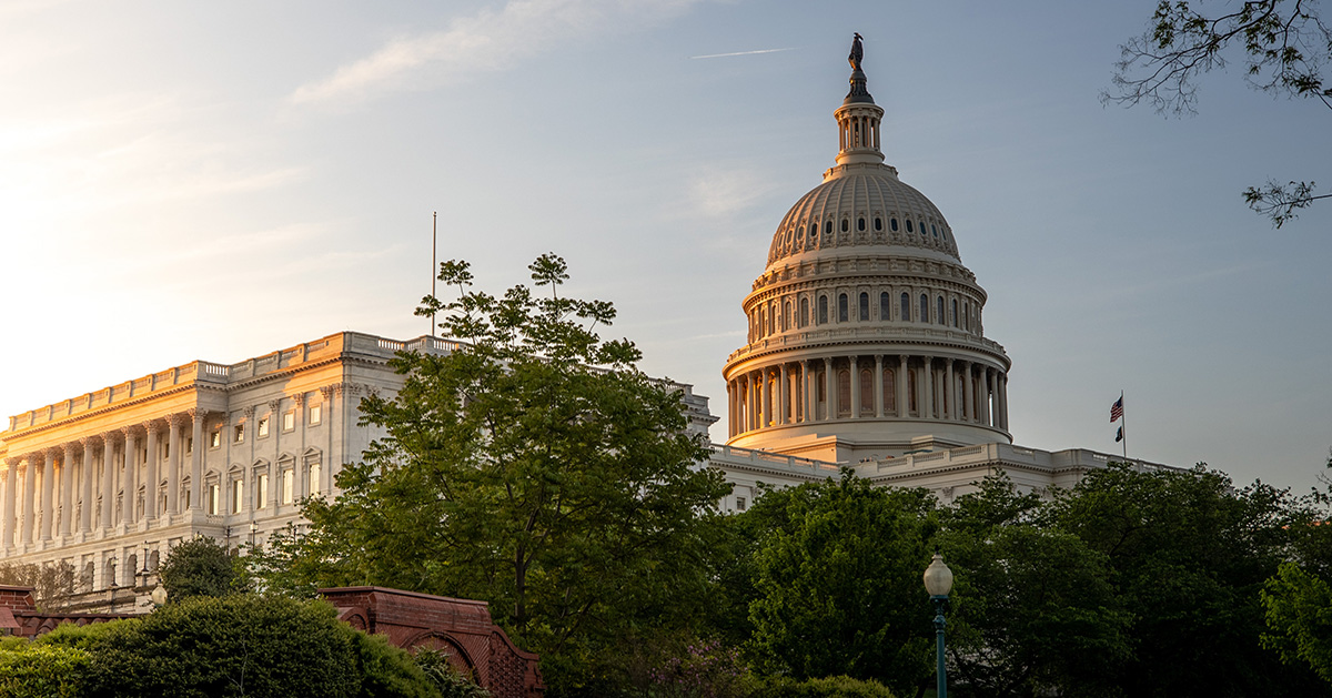 The morning light illuminates the U.S. Capitol building.